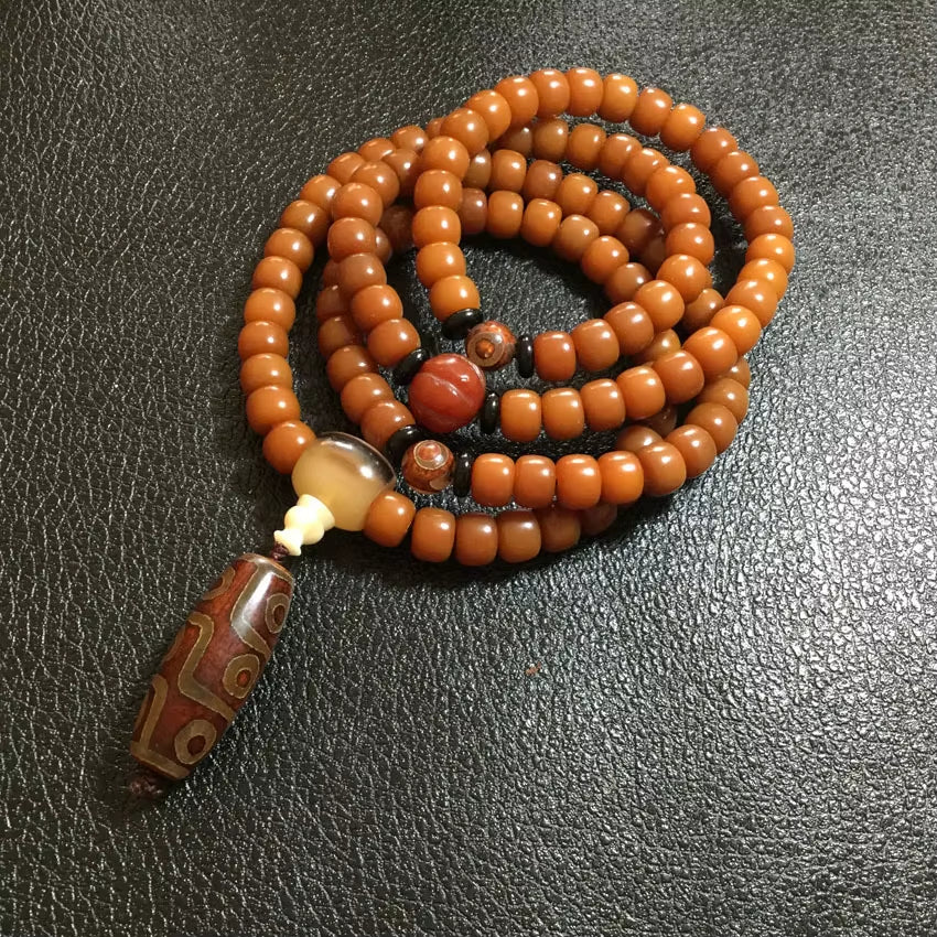 🐝 Natural Beeswax 108-Bead Buddhist Mala Bracelet with Nine-Eyed Agate Meditation Prayer Rosary Bracelet for Men & Women – Spiritual Jewelry by Spiritual Abacus