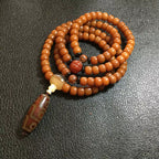 🐝 Natural Beeswax 108-Bead Buddhist Mala Bracelet with Nine-Eyed Agate Meditation Prayer Rosary Bracelet for Men & Women – Spiritual Jewelry by Spiritual Abacus