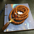 🐝 Natural Beeswax 108-Bead Buddhist Mala Bracelet with Nine-Eyed Agate Meditation Prayer Rosary Bracelet for Men & Women – Spiritual Jewelry by Spiritual Abacus