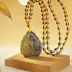 Spiritual Abacus™ Hand-Carved Ice Yellow Crystal Buddha Pendant – Fashion Charm Necklace for Mindfulness & Style